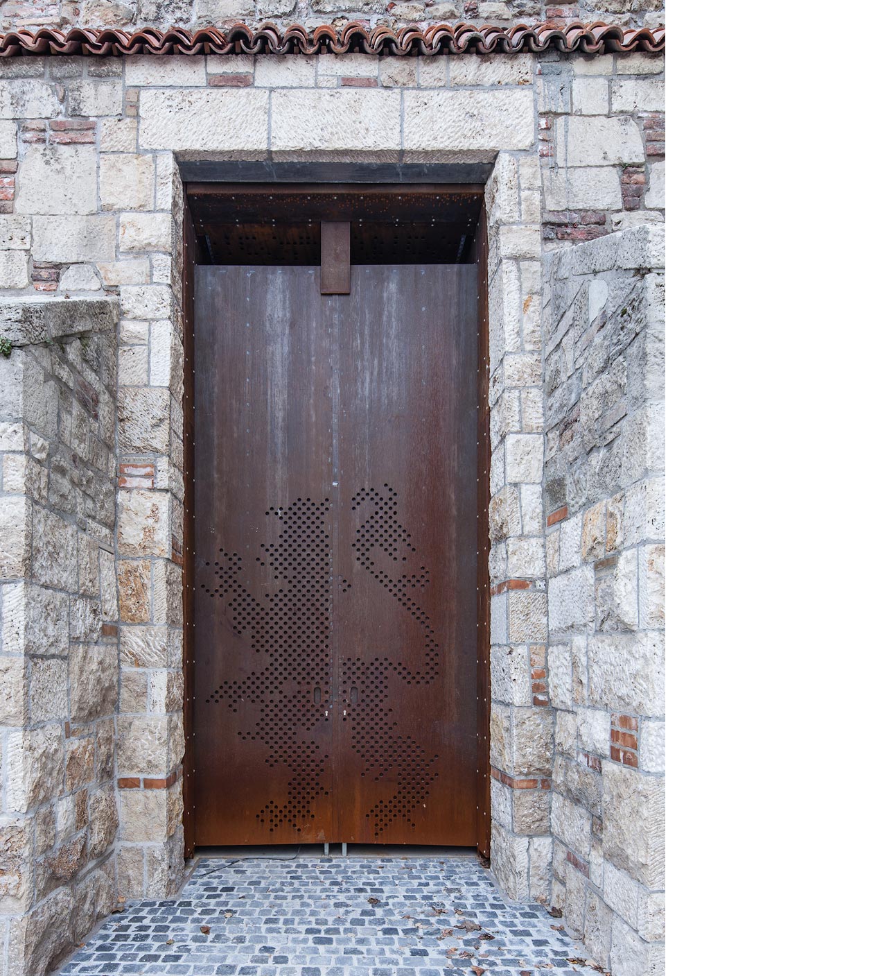 Perforated COR-TEN steel used for a door