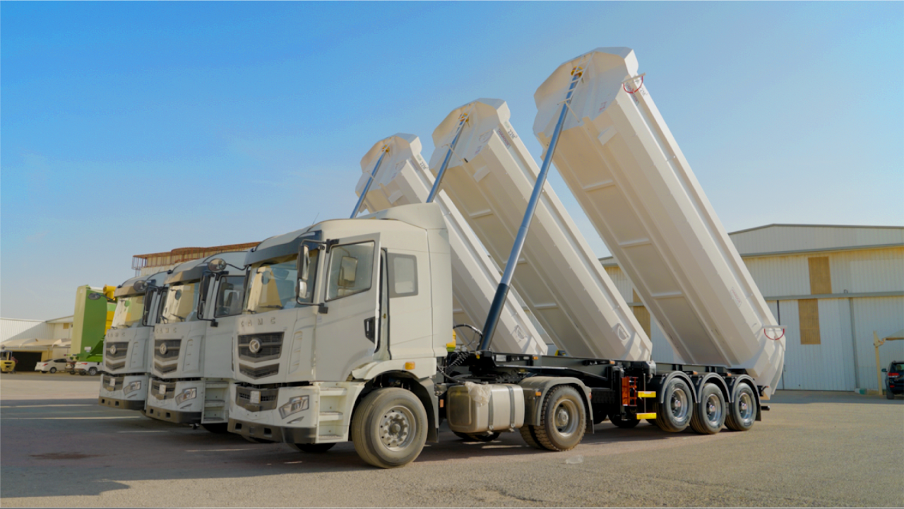 A row of all-white tipper trucks from Al Jeathen, with bodies made in Hardox 500 Tuf wear steel. 