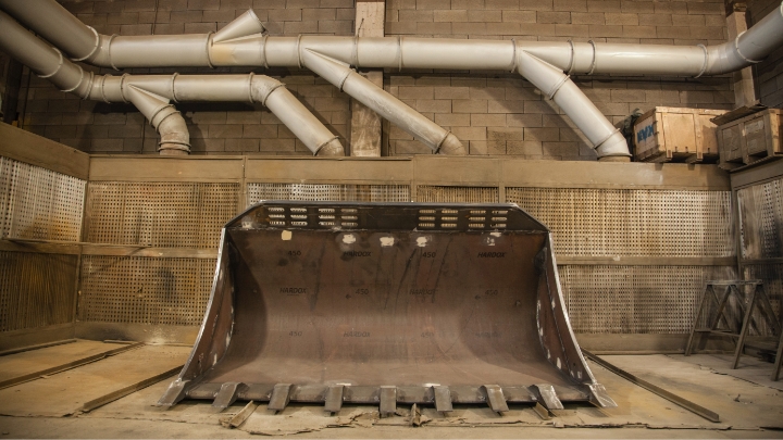 A huge excavator bucket made in strong and hard Hardox® 450 steel