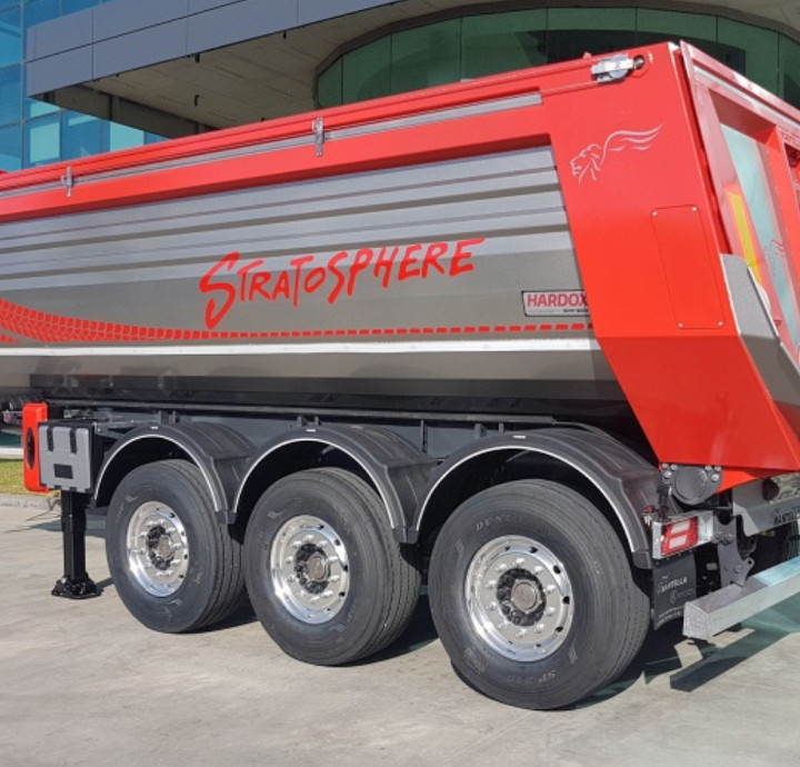 Close-up of a red Stratosphere tipper trailer showing the Hardox In My Body logo