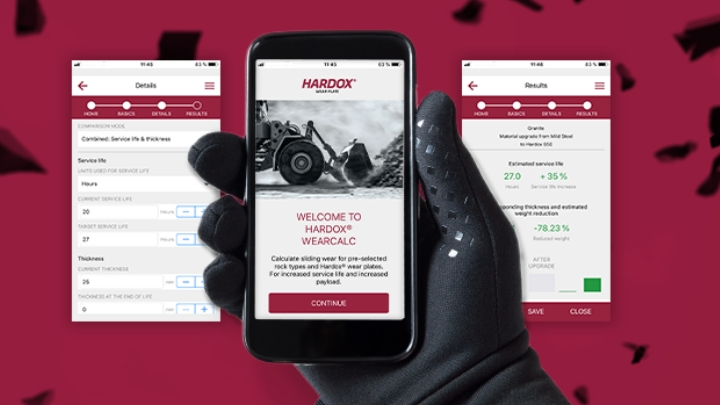 A hand holding the mobile app Hardox® Wearcalc, which calculates wear for different Hardox® steel grades