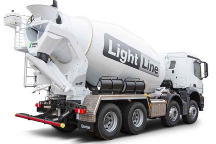 A concrete mixer truck in black and white, with mixer drum made in Hardox® wear steel.