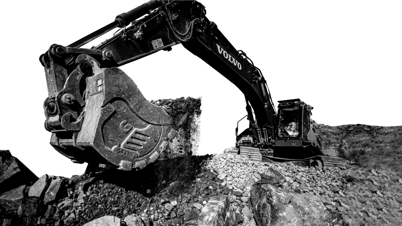 Phụ kiện gầu xúc lật Fronteq được chế tạo bằng thép Hardox® 500 Tuf đang thực hiện công việc đào đá cứng và đá mài đầy khó khăn.