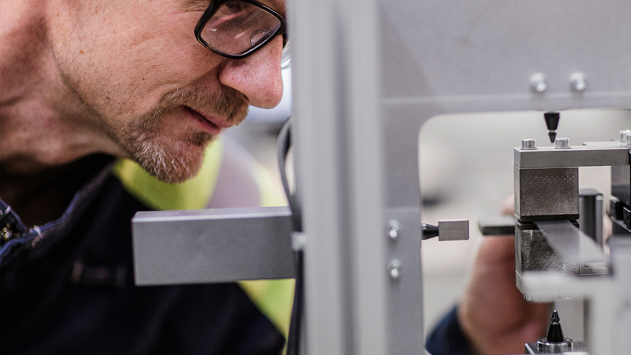 A man testing steel in an SSAB laboratory.