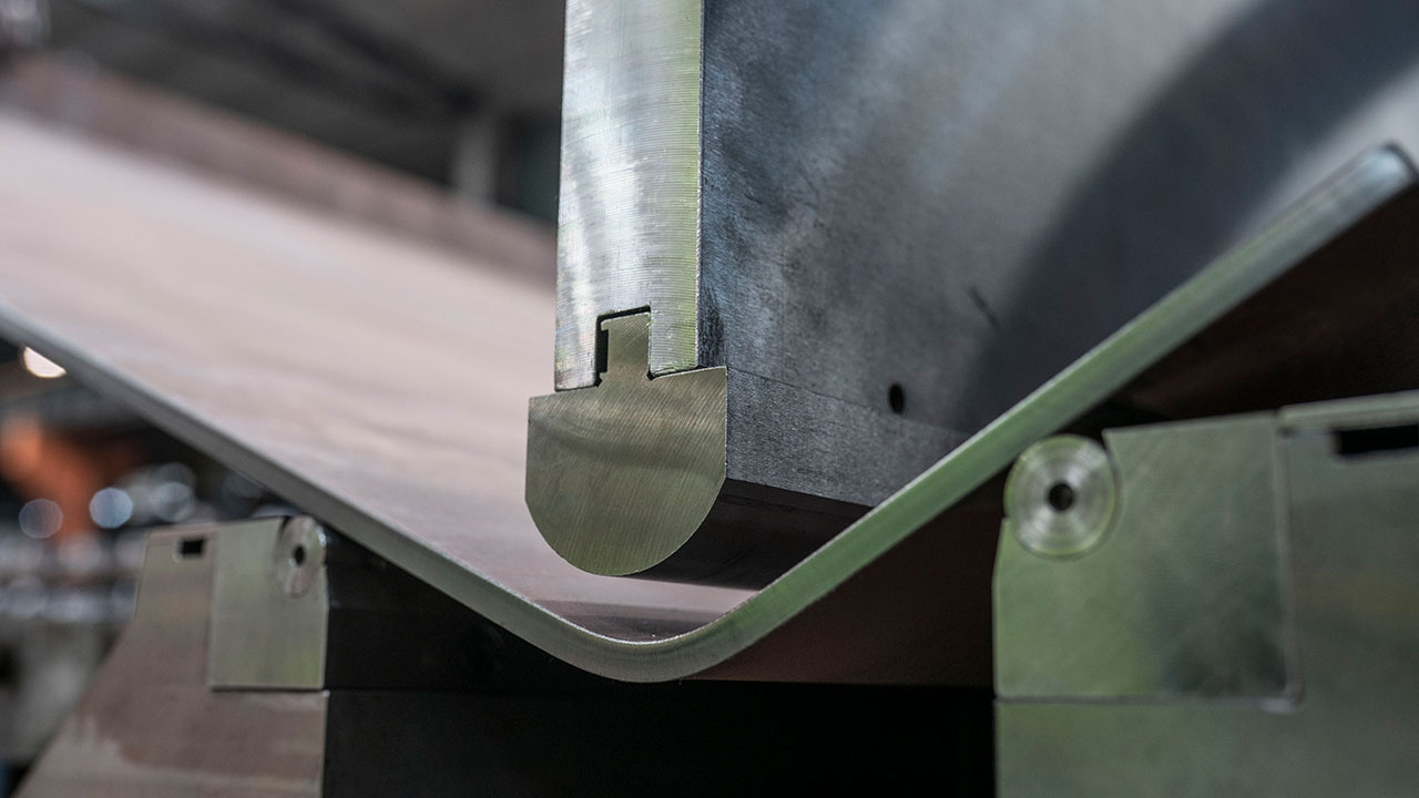 Steel processing - bending of plate.