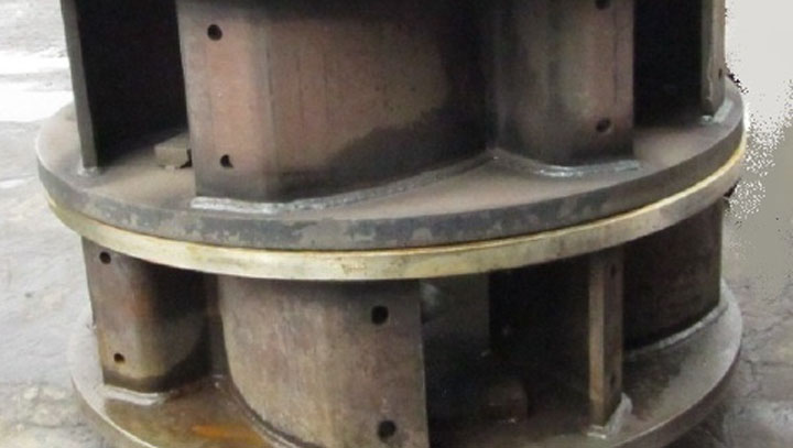 Vertical shaft impact crusher rotor made from Hardox® 450 and Hardox® 600 wear plate.