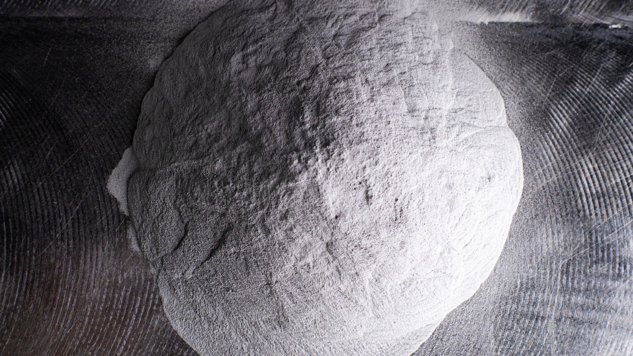 An overhead view showing a pile of metal powder