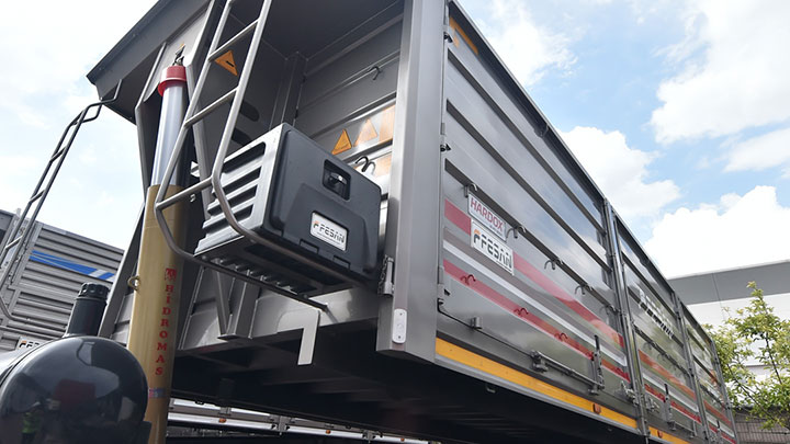 Back view of a shiny gray semitrailer dumper from Turkish company Fesan.