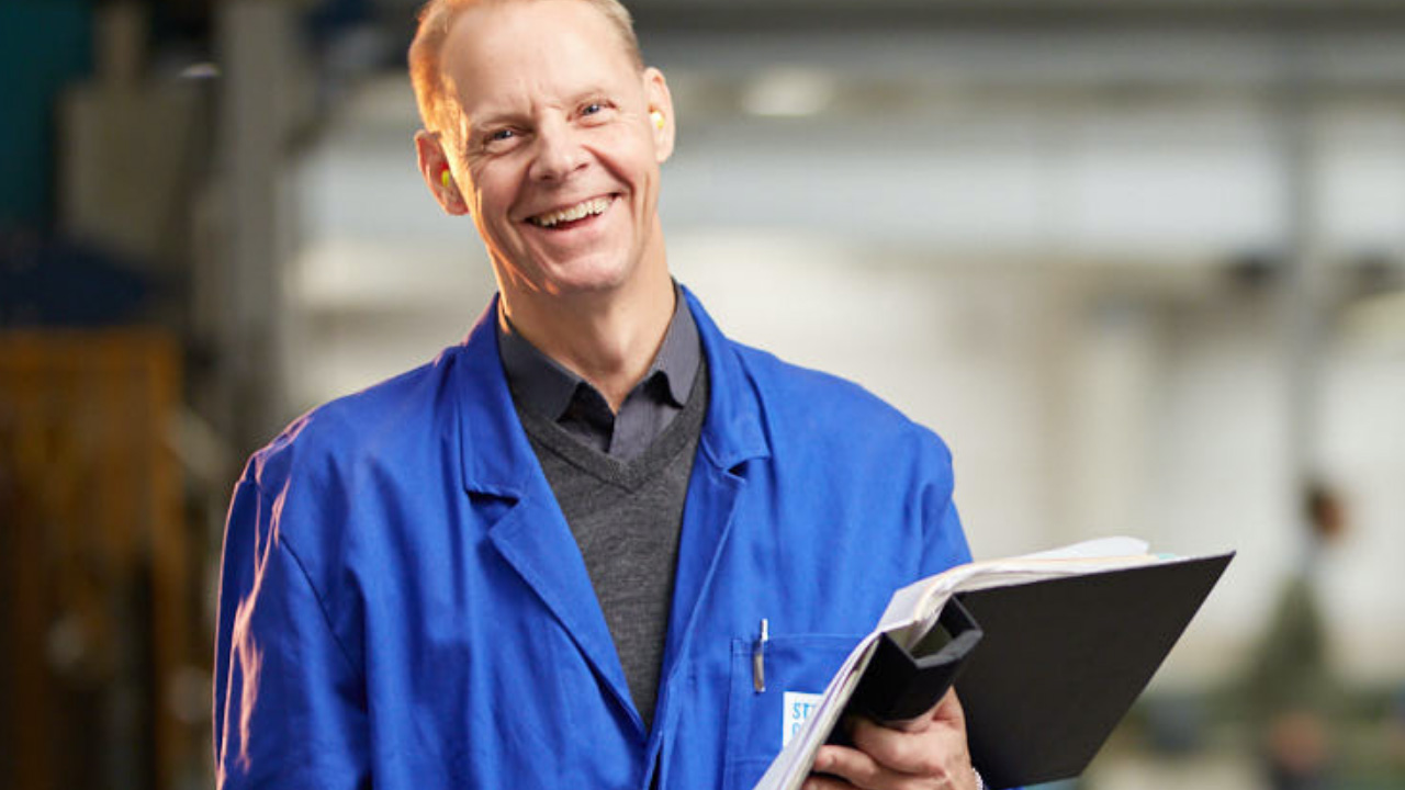 Toolox user holding a binder